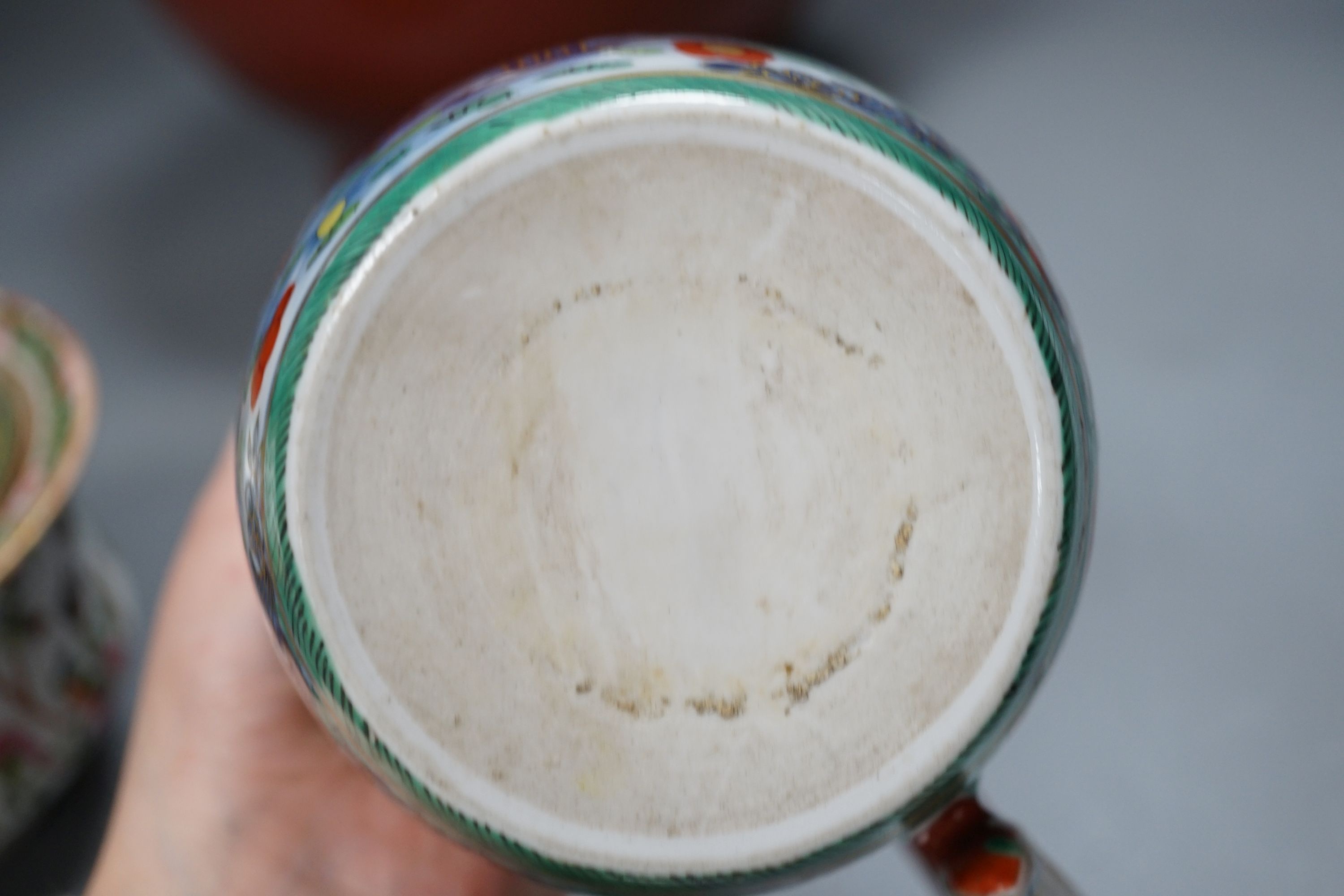 A 19th century Chinese famille rose pot and cover, 15cm diam., together with a decorative Chinese jug and large monochrome china pot